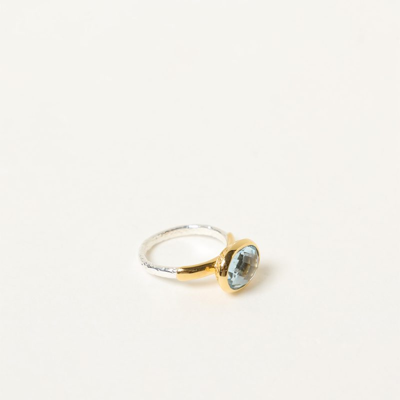 Anello bicolor con topazio
